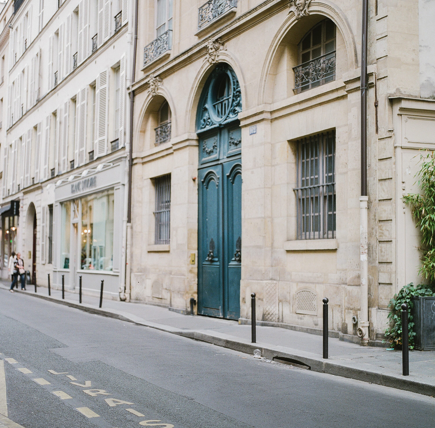 street in Paris France. Teal blue door. Photo by Judith Rae.